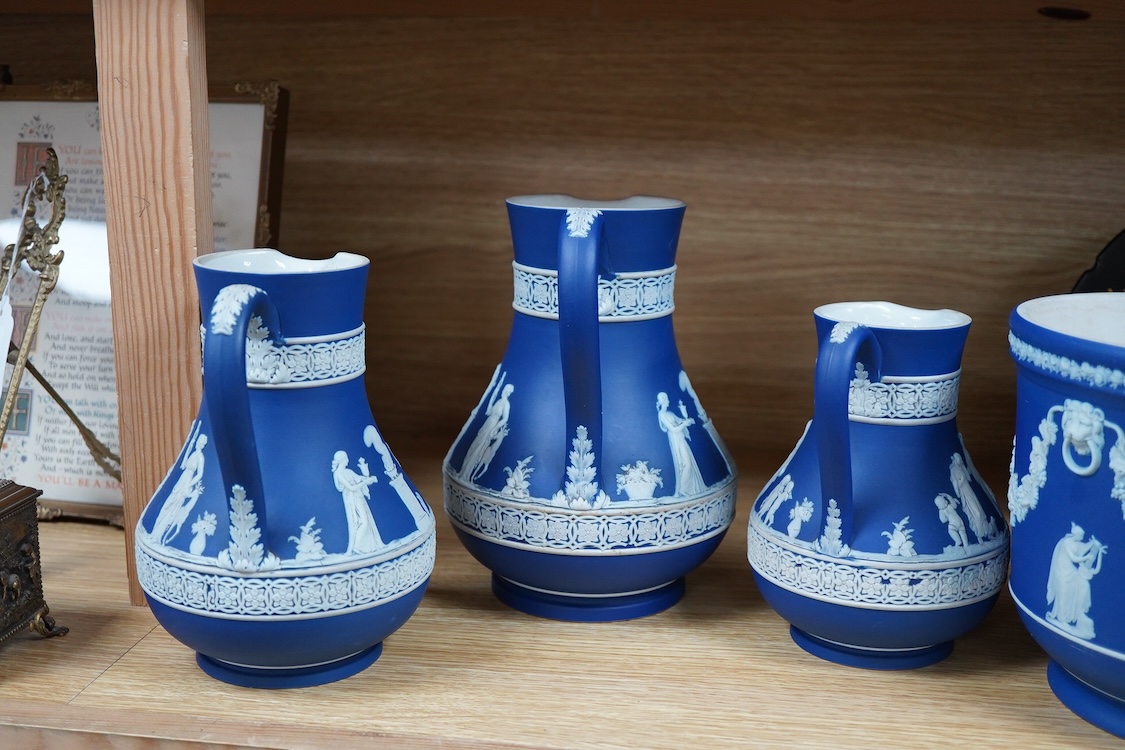 Three 19th century Wedgwood graduated jasper ware jugs and a jardiniere- 16.5cm